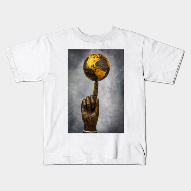 Globe Balenced On A Finger Kids T-Shirt by photogarry